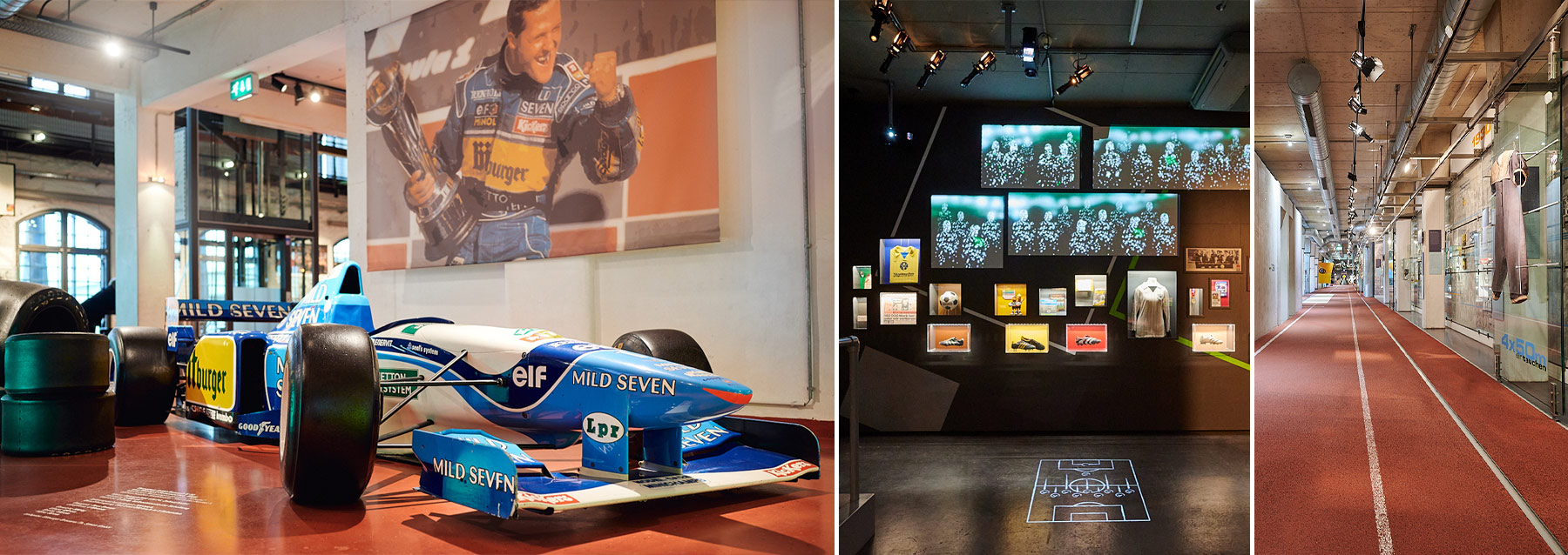 Das Bild ist in drei Teile aufgeteilt. Auf der linken Seite steht ein Formel-1-Wagen. Um den Wagen herum stehen weitere Reifen. An der Wand hängt eine Leinwand. Auf der Leinwand ist Michael Schumacher mit einem Pokal zu sehen. Im Hintergrund sind große Fenster und ein Fahrstuhl. In der Mitte wird der Fußballraum dargestellt. An der Wand sind verschiedene Exponate. Zum Beispiel sind da ein Trikot, Fußballschuhe und Bilder. Rechts auf dem Bild ist eine Wand mit einer Zeitleiste zu den Olympischen Spielen. An der Wand sind verschiedene Daten zu den Olympischen Spielen. Es gibt verschiedene Ausstellungsstücke an der Wand. Ein Ausstellungsstück, das wir sehen können, ist ein alter Badeanzug. Der Boden ist eine Laufbahn und geht bis zum Ende der Dauerausstellung.
